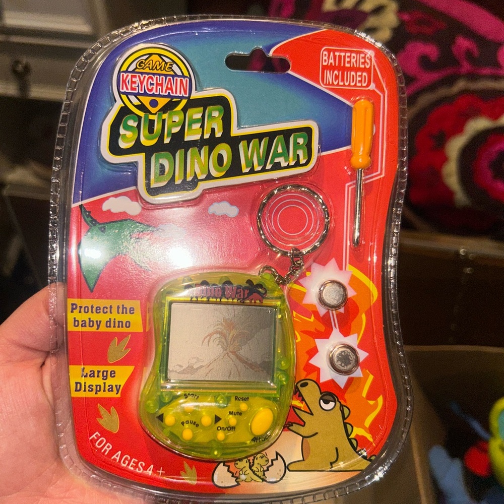 Super Dino War Keychain Game